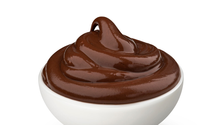 chocolate hazelnut paste in a white bowl