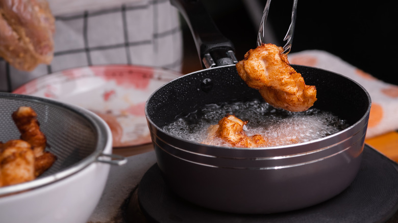 Frying pieces of chicken