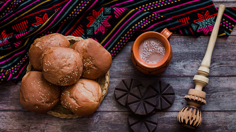 Mexican hot chocolate with bread and molinillo