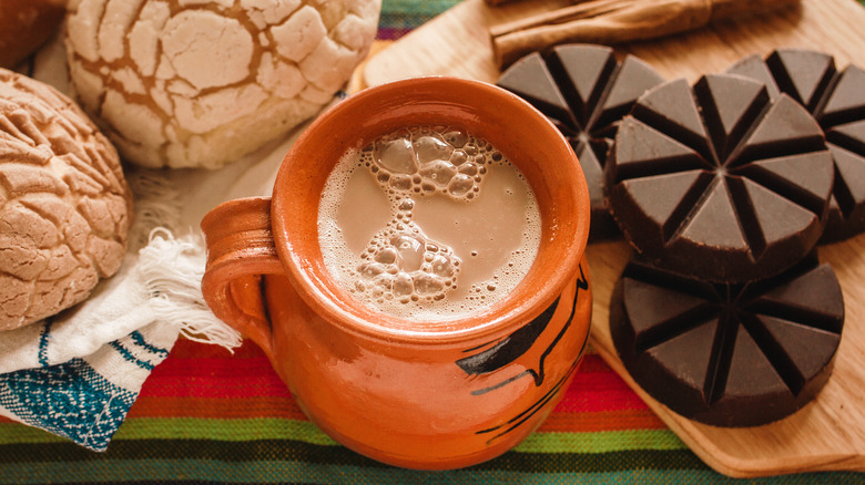 Mexican hot chocolate with chocolate and conchas