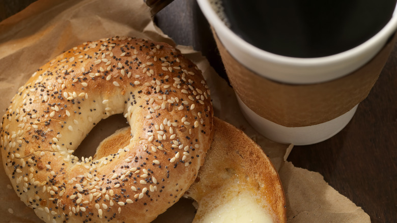 sliced bagel with coffee