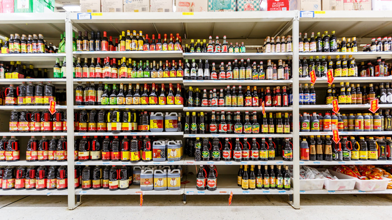 shelf of soy sauces