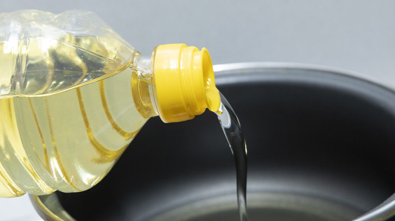 pouring cooking oil