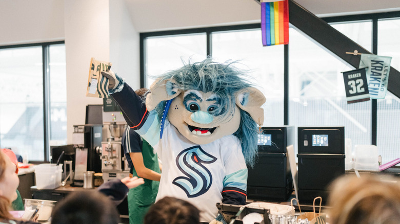 Seattle Kraken mascot in Starbucks