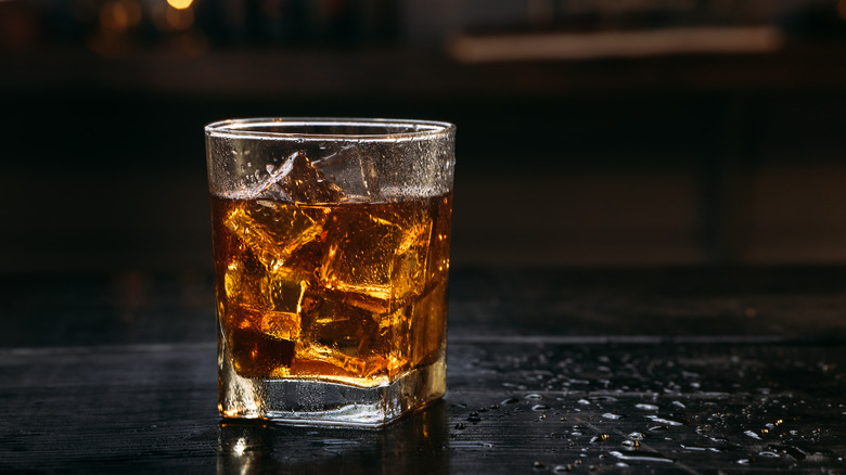 whisky served with ice in glass