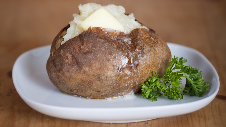 Baked potato on plate
