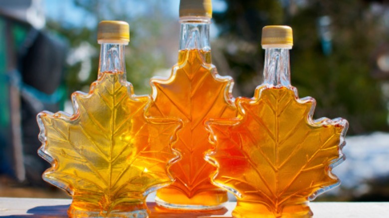 Maple syrup bottles outdoors