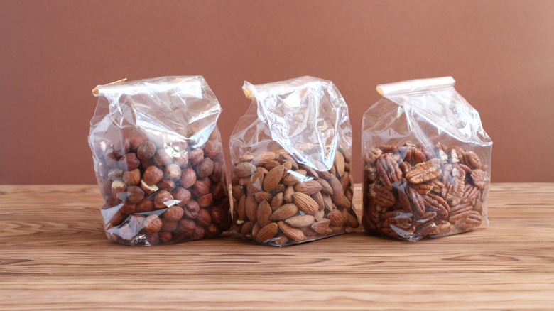 Bags of nuts on table
