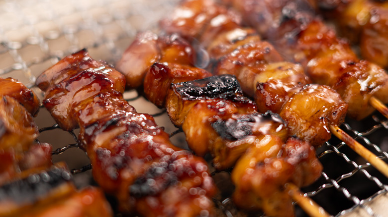 meat kebabs on a grill