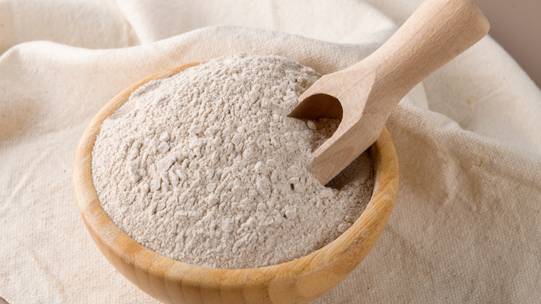 bowl and scoop of coarse flour