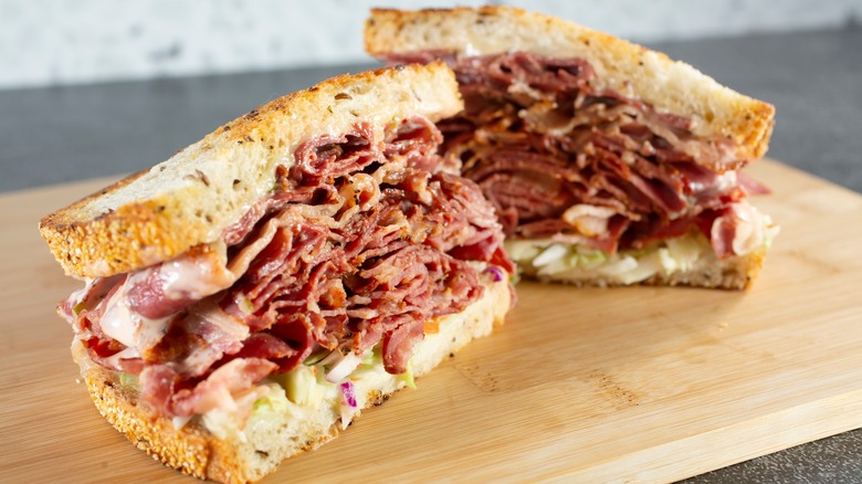 pastrami sandwich cut in half