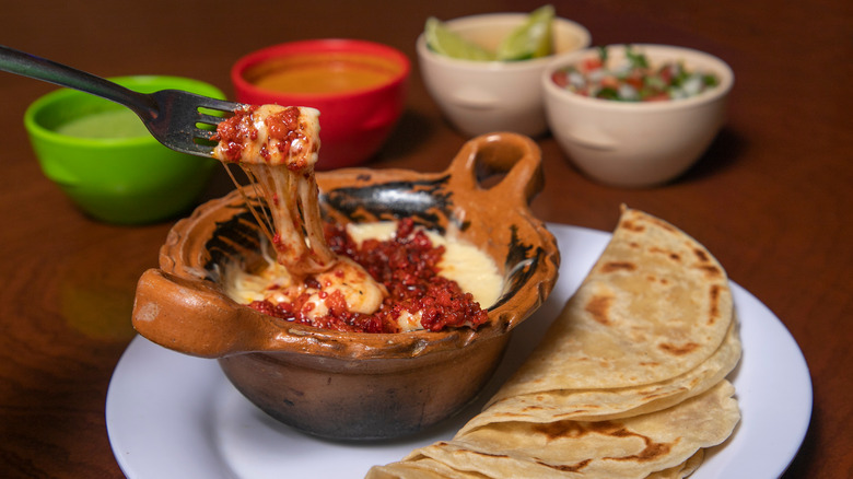 queso fundido served with tortillas