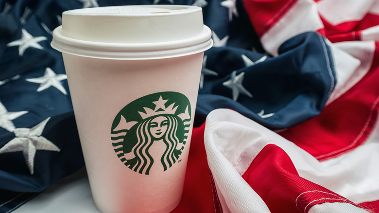 American flag by Starbucks cup