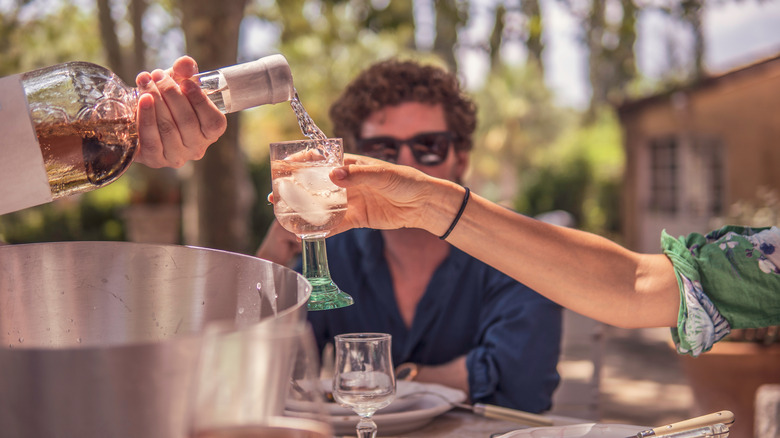 Rosé being poured over ice