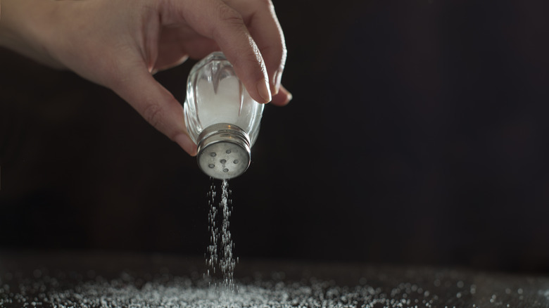 Salt falling out of a salt shaker