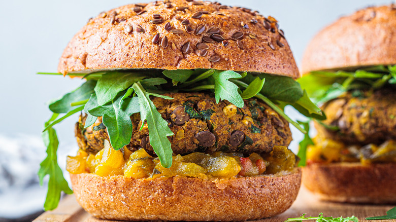 Vegan lentil burger with arugula