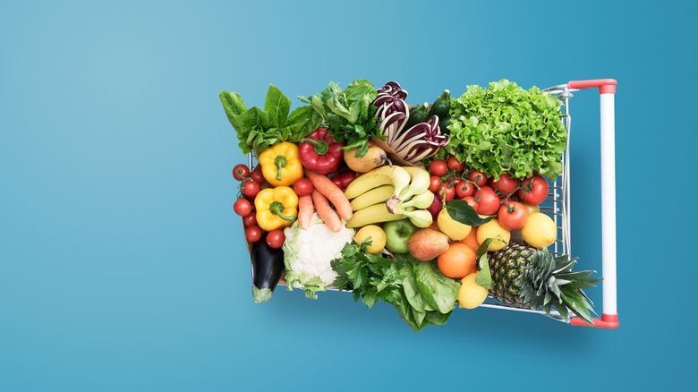 grocery cart full of vegetables