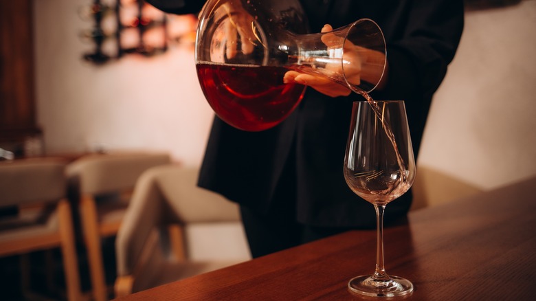 pouring wine from decanter