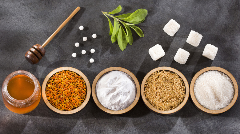 sweeteners in bowls on table