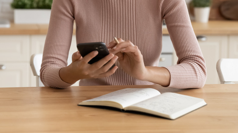 Woman scrolling on phone 