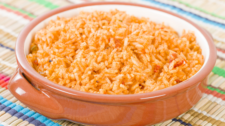 Mexican rice in orange bowl