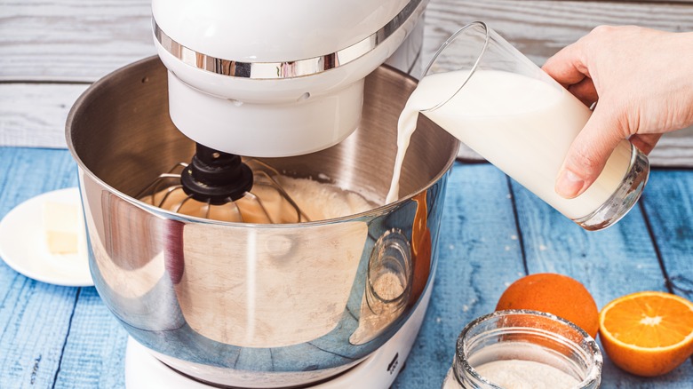 pouring cream into batter