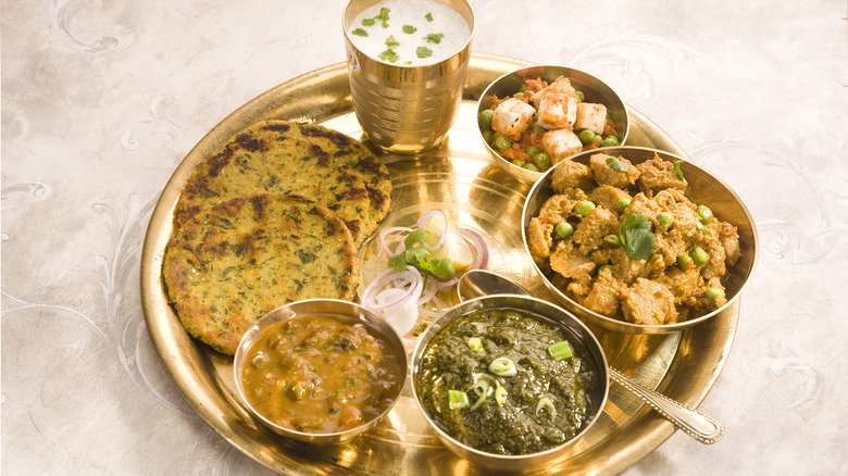 Thali dish on beige background 