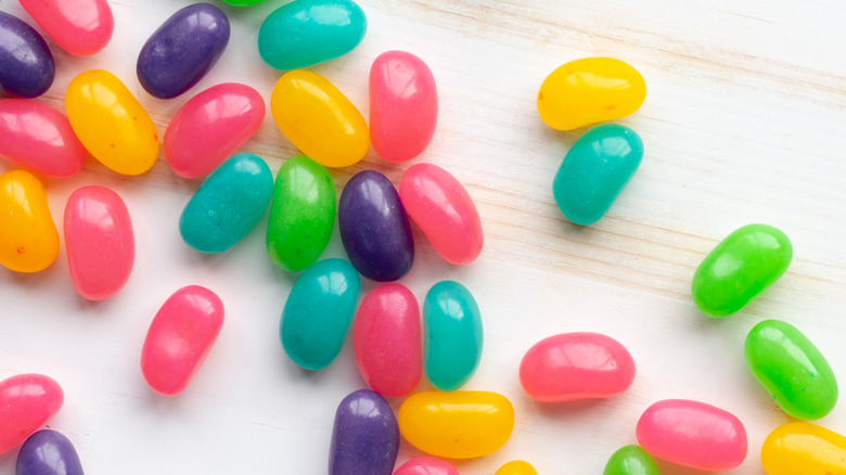 Jelly beans on white wood