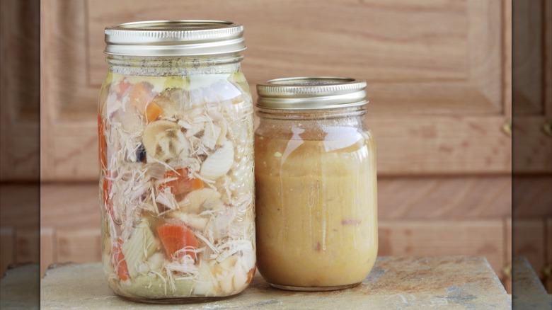 Different sizes of soup jars on a table