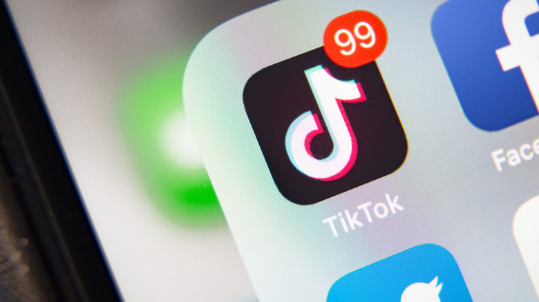 TikTok logo on phone