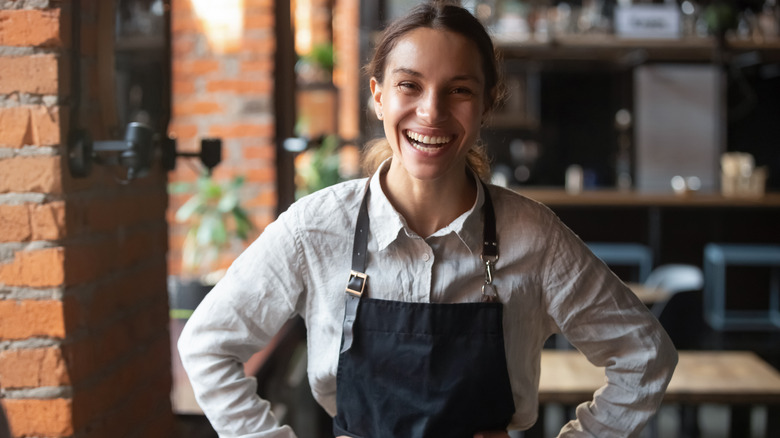 restaurant server smiling