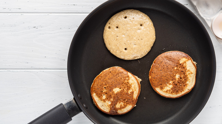 pancakes cooking on pan