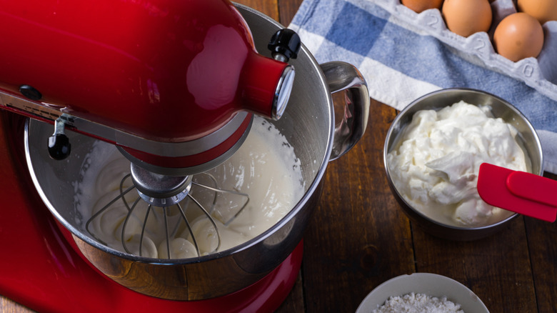 Mixer on counter with ingredients