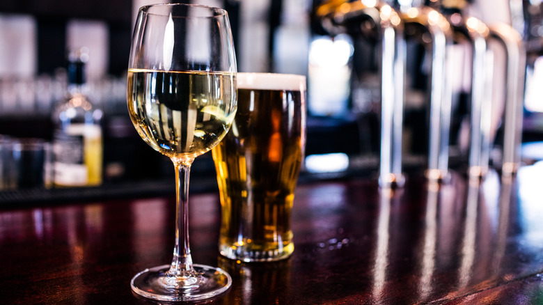 glass of white wine at a bar