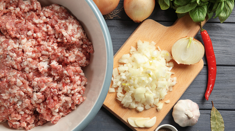 bowl of ground turkey surrounded by ingredients