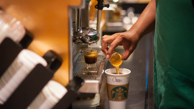 Starbucks barista making espresso 