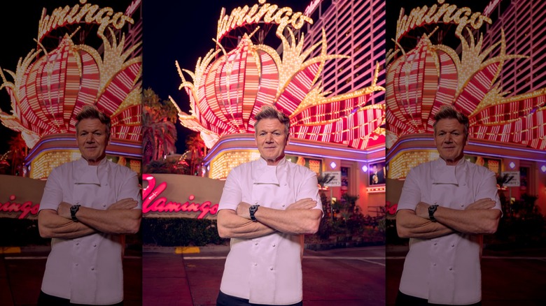 Gordon Ramsay standing in front of the Flamingo Hotel & Casino in Las Vegas