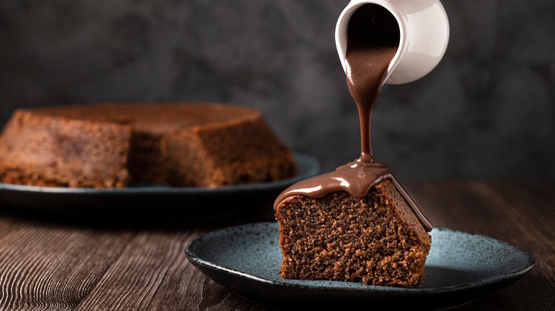 Chocolate syrup cake pour 