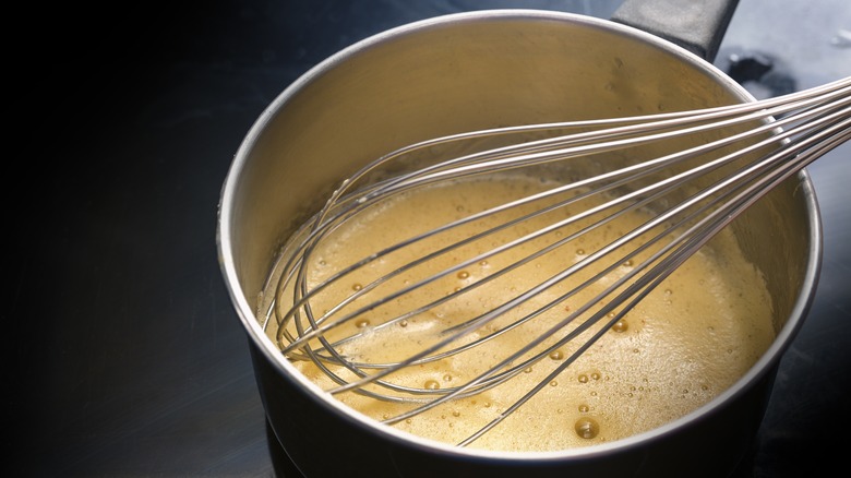 whisking Hollandaise sauce