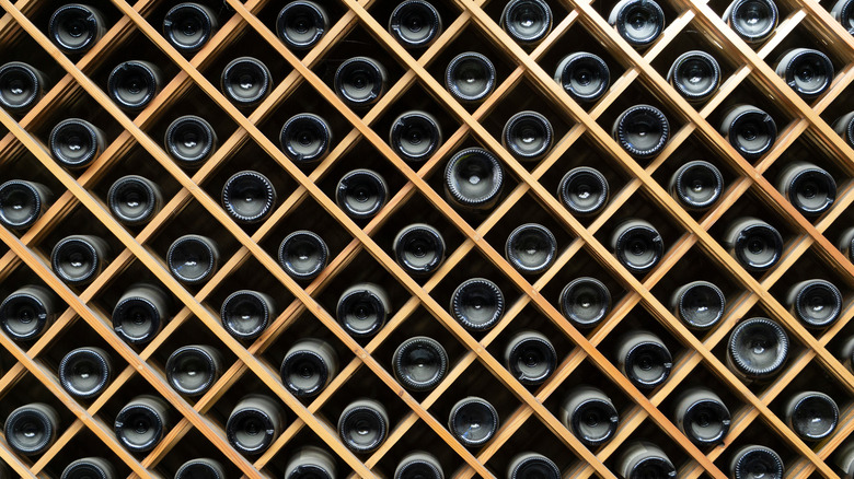 wine bottles stored on shelf