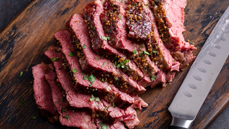 Corned beef sliced on a cutting board