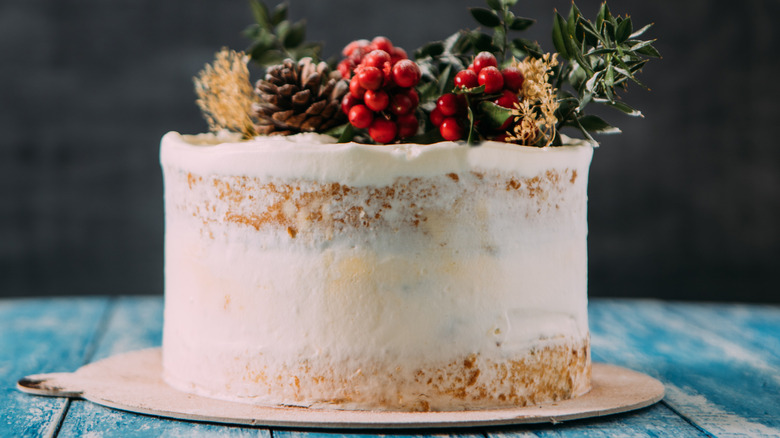 Semi-naked cake on a rustic wooden table