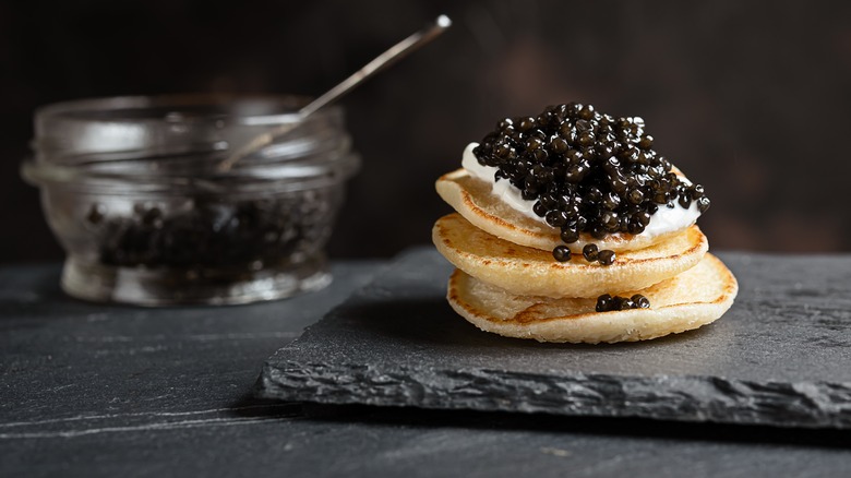 blini served with caviar