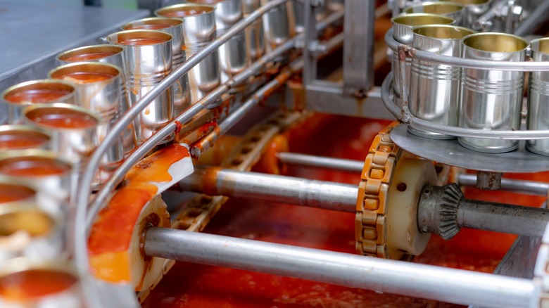 Tomato sauce being canned