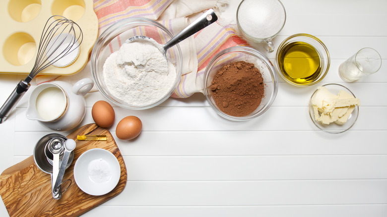 muffin ingredients on white counter