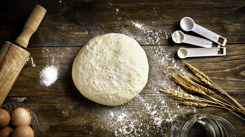 bread dough on floured wood