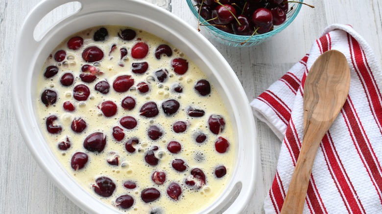 making cherry clafoutis in dish