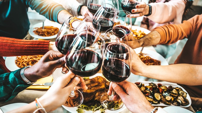 Foodies at a home wine-tasting party