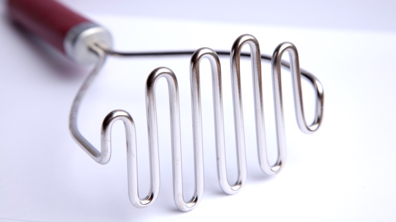 wire potato masher close up