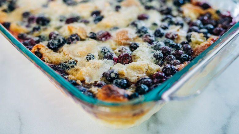 Homemade blueberry cobbler in a glass baking dish